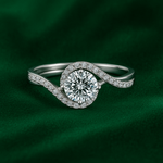 Kyonara Round Solitaire Ring with a brilliant round-cut cubic zirconia on a silver tone band